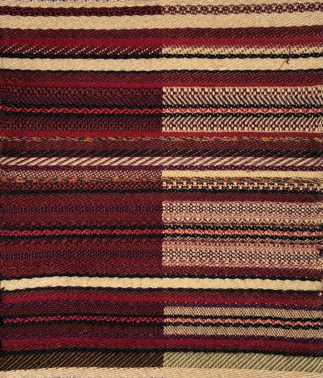 Close-up of material exploration swatch with velvet, beads and metallic ribbon
